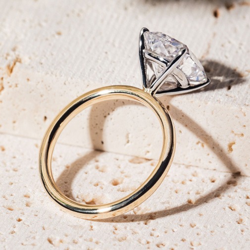 Alternative metal engagement ring bands including tungsten, titanium, and platinum with modern, durable styles Selection of engagement ring bands crafted from alternative metals such as tungsten, titanium, and platinum, showing modern finishes and durable designs