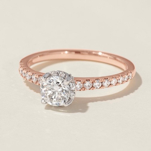 Pavé Round Diamond Engagement Ring with Sparkling Band Pavé round diamond engagement ring with small diamonds set along the band