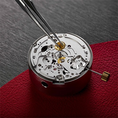TUDOR Heritage Collection Vintage TUDOR watch on red background